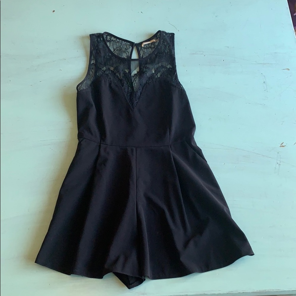 Black romper size M